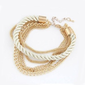 gold chain and white rope bracelet